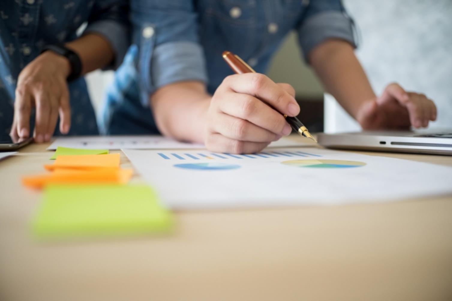 Financial planning workspace with strategic documents